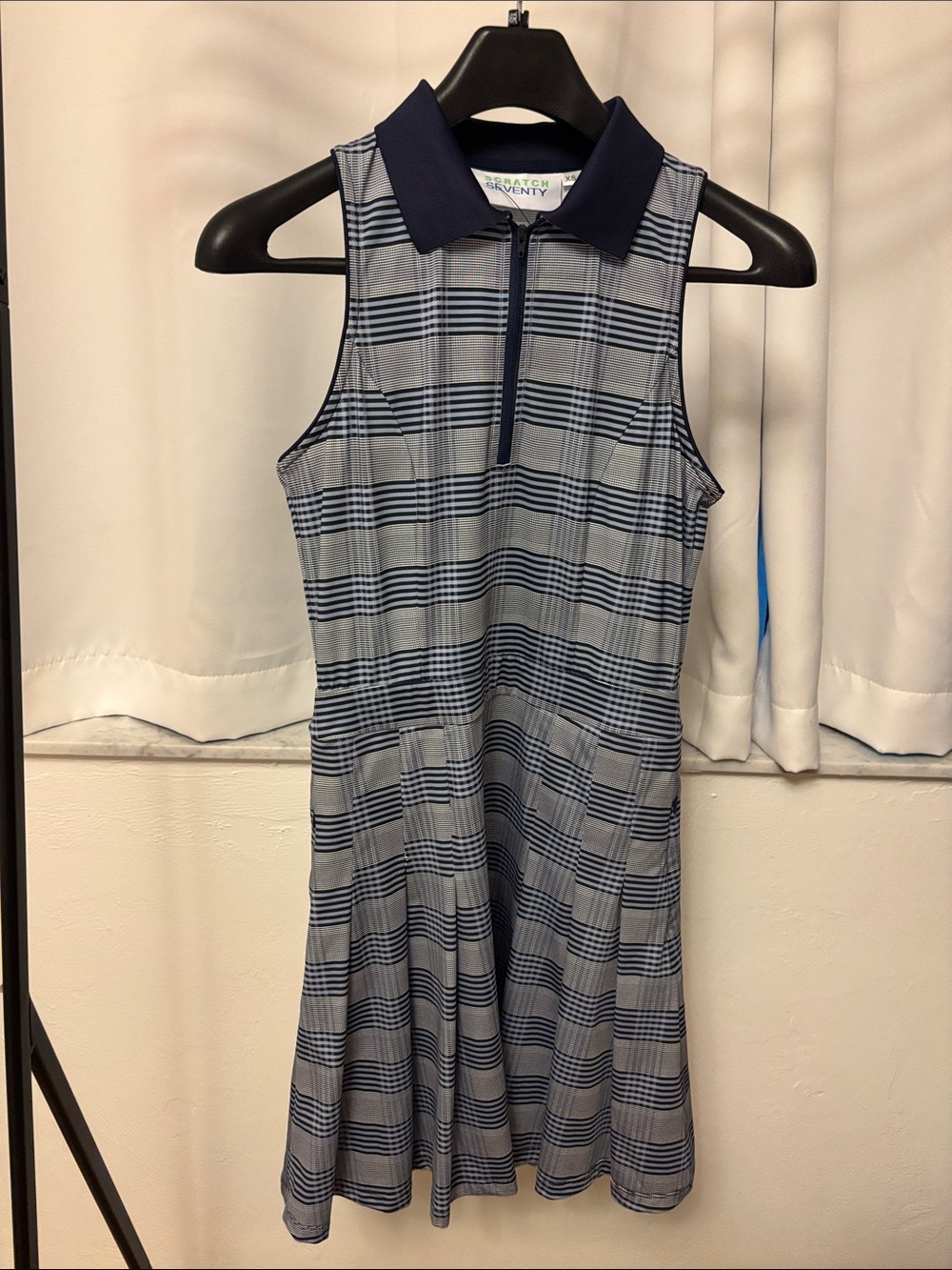 Sleeveless Plaid Polo Athletic Dress in Navy and Light Gray.